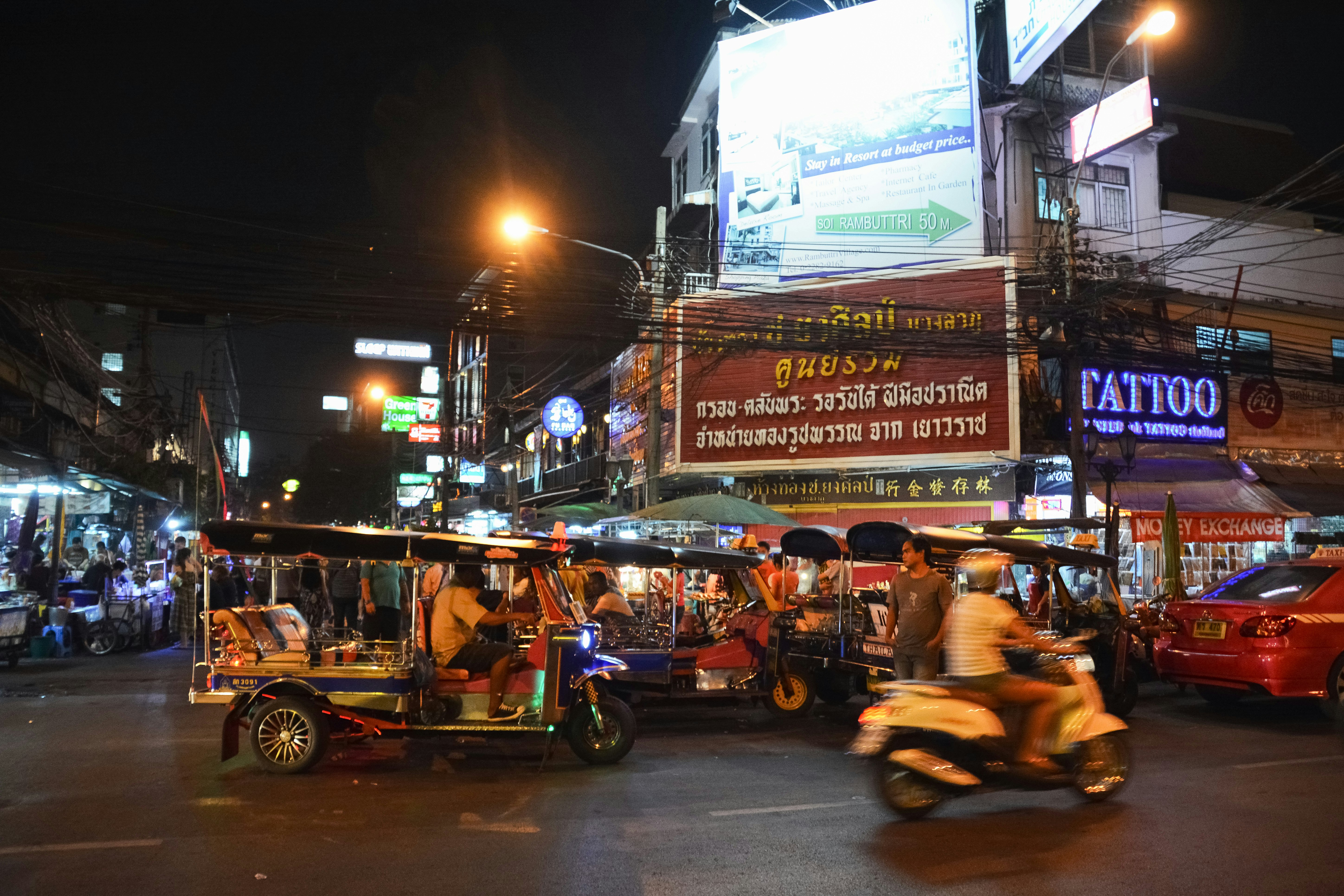 people riding on motorcycle during night time